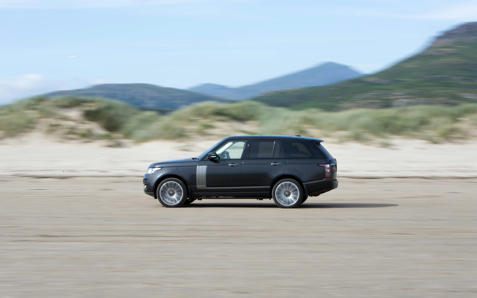 Range Rover on a British coast road
