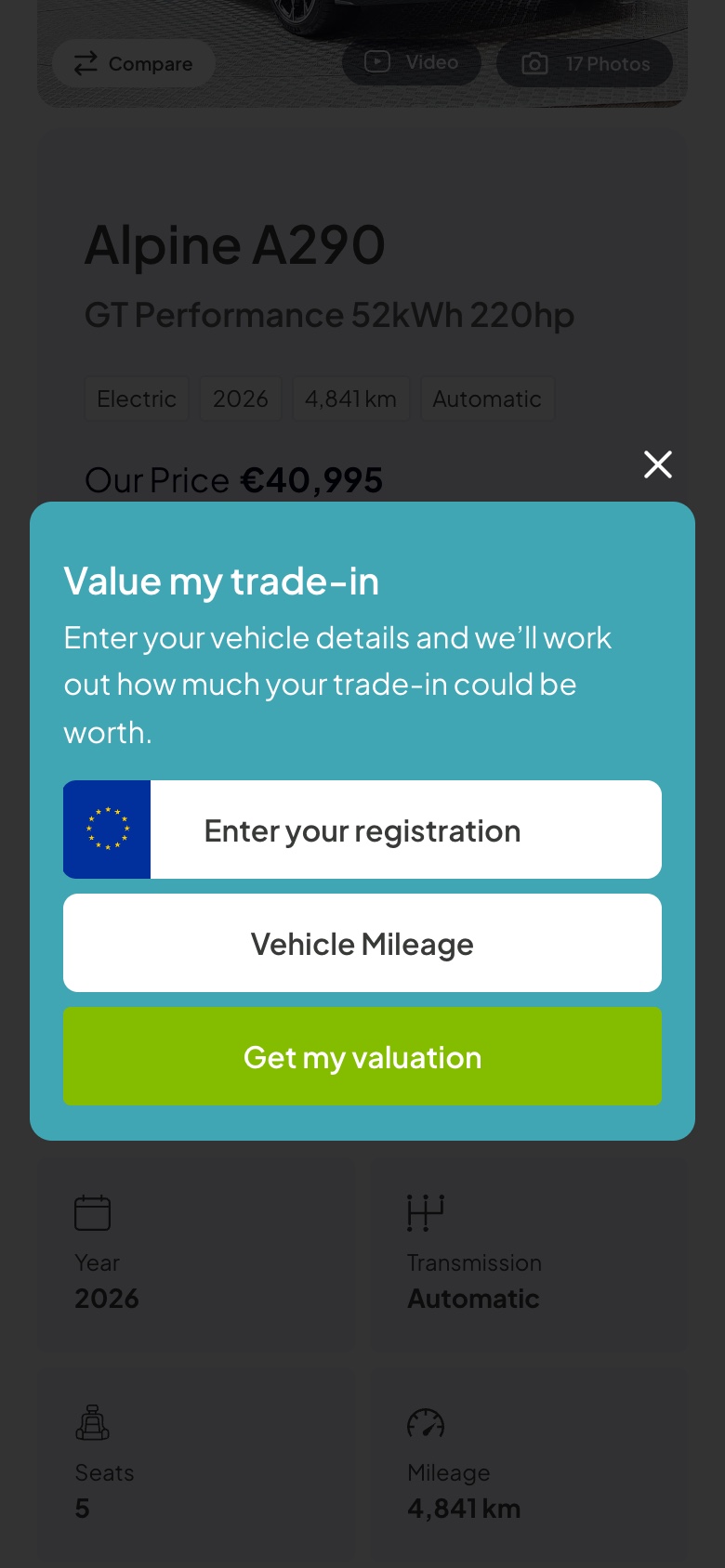 The Value my trade-in panel on a vehicle page on a phone, asking for registration and mileage